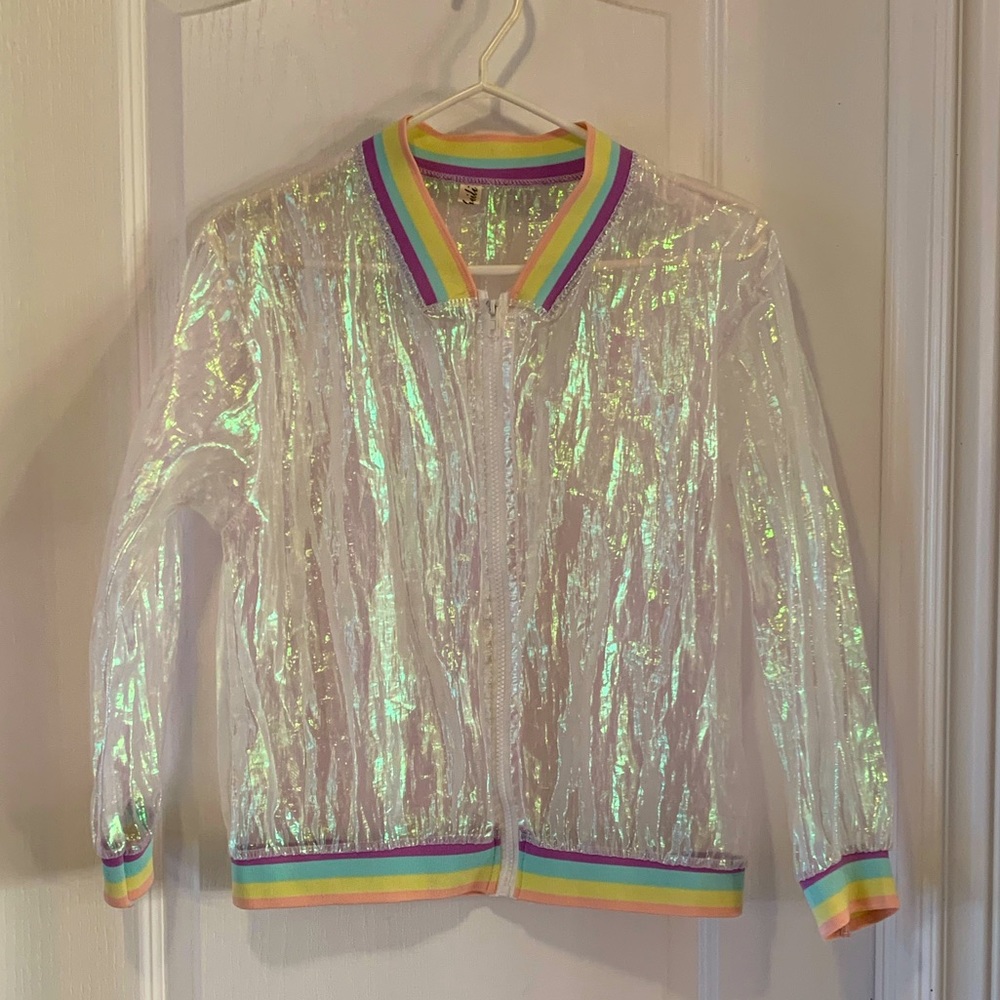 ✨ Iridescent coat with pastel details 🌈
